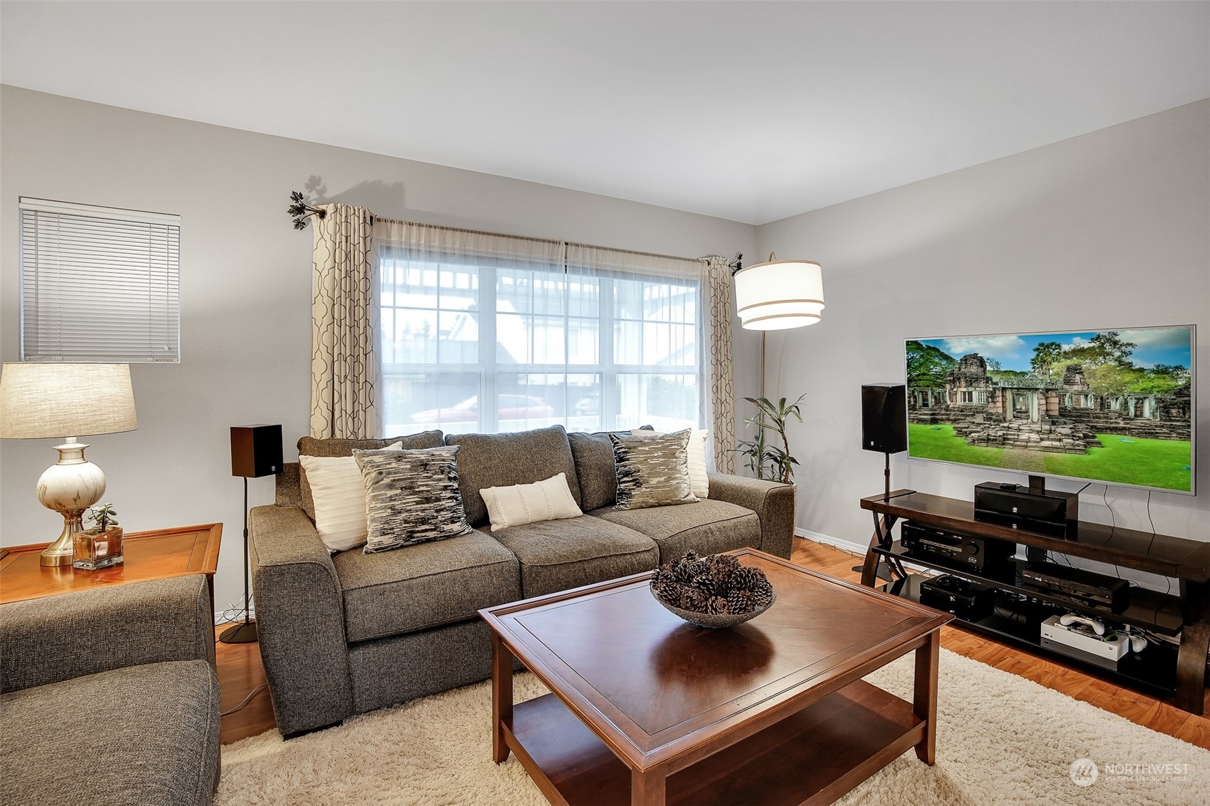 3834 Northeast 5th Place Renton, WA 98056 - Photo 13 of 39 a living room with furniture and a flat screen tv