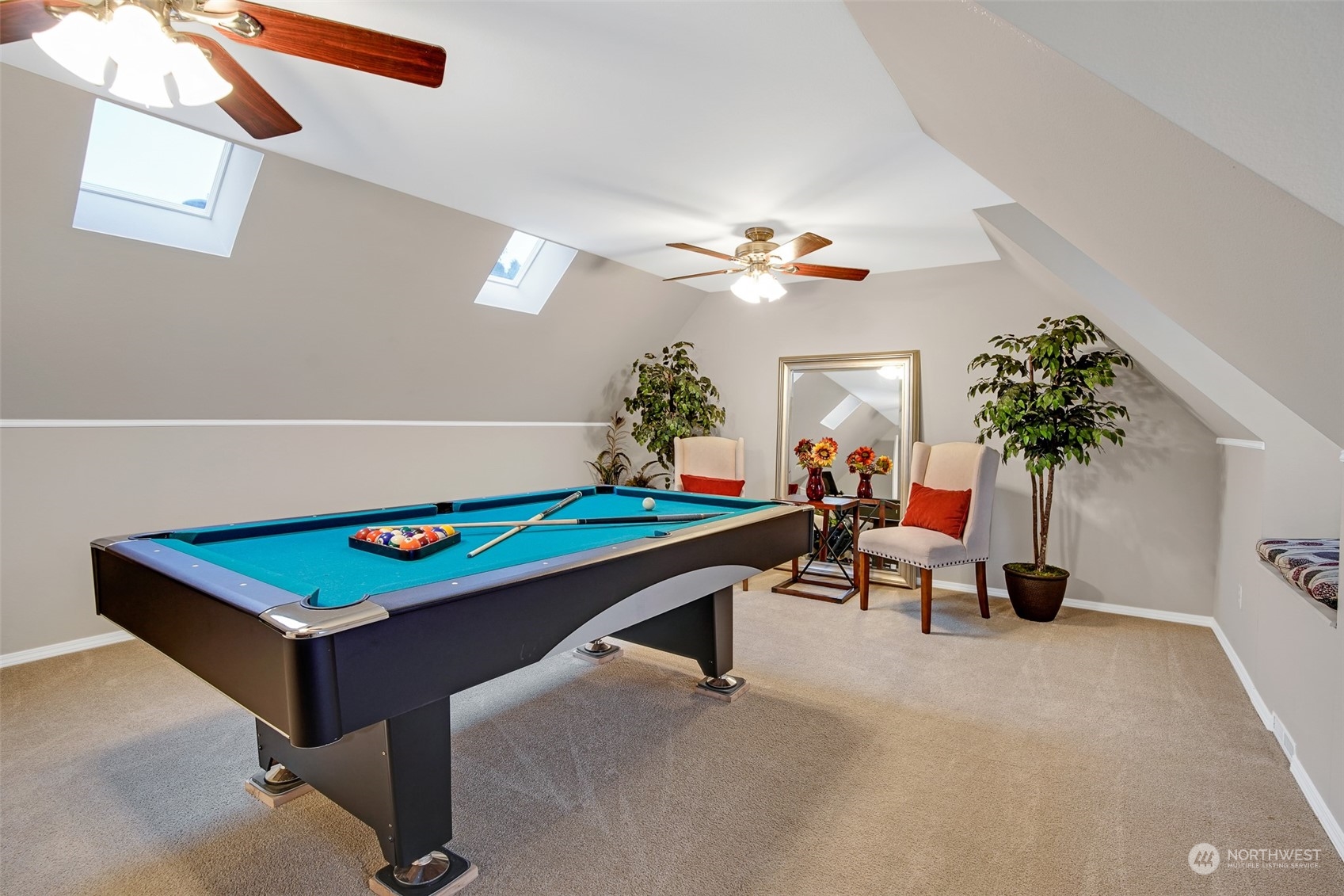 3834 Northeast 5th Place Renton, WA 98056 - Photo 35 of 39 a room with furniture pool table and chandelier