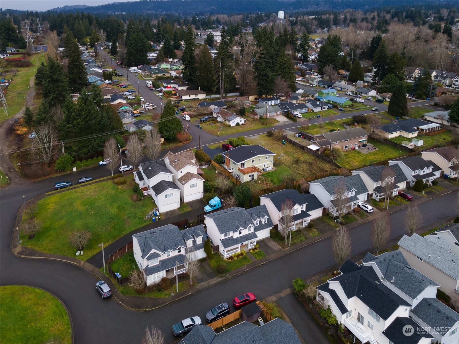 3834 Northeast 5th Place Renton, WA 98056 - Photo 4 of 39 an aerial view of a house with a swimming pool yard and outdoor seating
