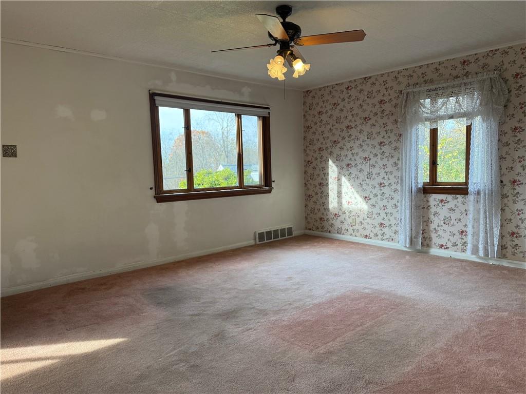 2086 River Hill Road Monongahela, PA 15063 - Photo 12 of 23 an empty room with windows and fan