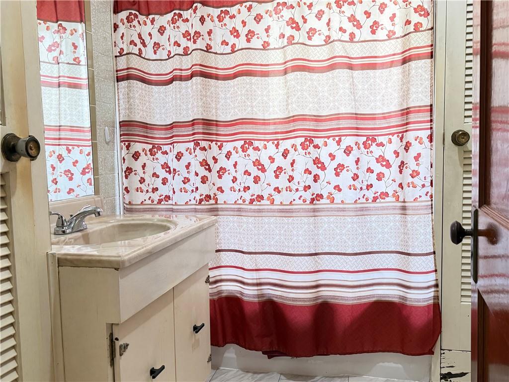 2086 River Hill Road Monongahela, PA 15063 - Photo 14 of 23 a bathroom with a sink and a bathtub