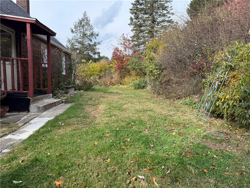 2086 River Hill Road Monongahela, PA 15063 - Photo 17 of 23 a view of a yard with plants and trees