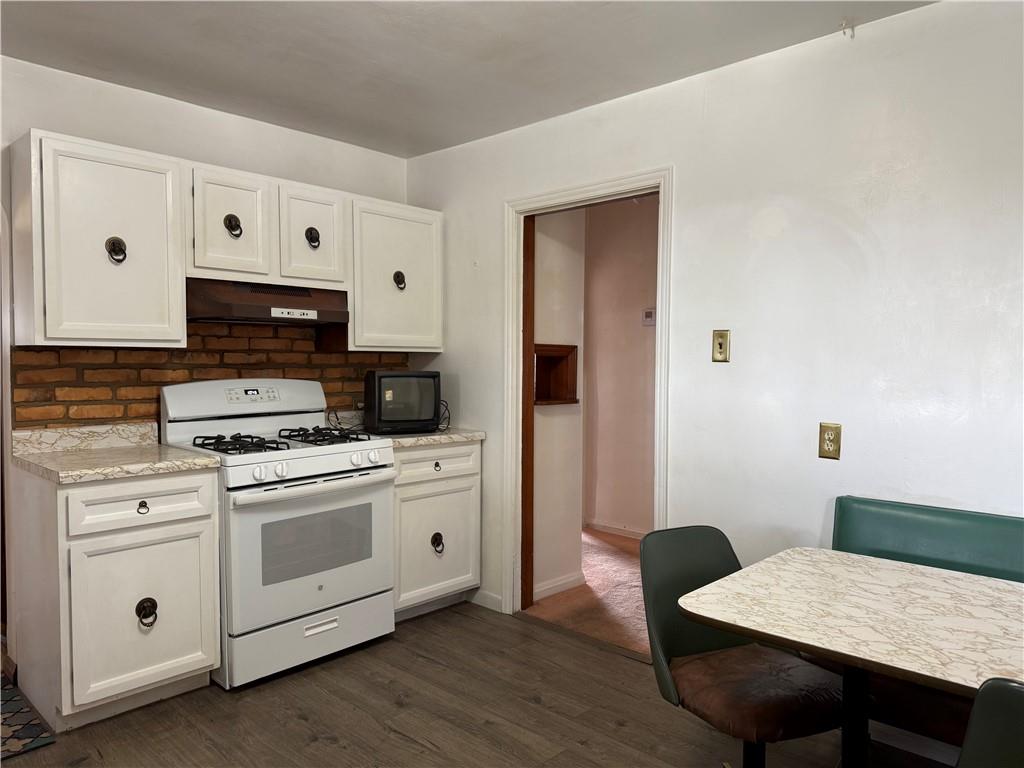 2086 River Hill Road Monongahela, PA 15063 - Photo 2 of 23 a kitchen with cabinets appliances and wooden floor
