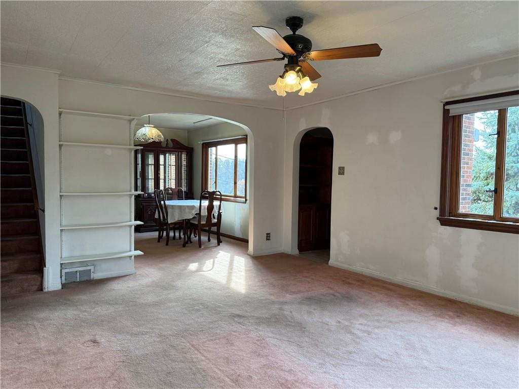 2086 River Hill Road Monongahela, PA 15063 - Photo 9 of 23 an empty room with windows and ceiling fan