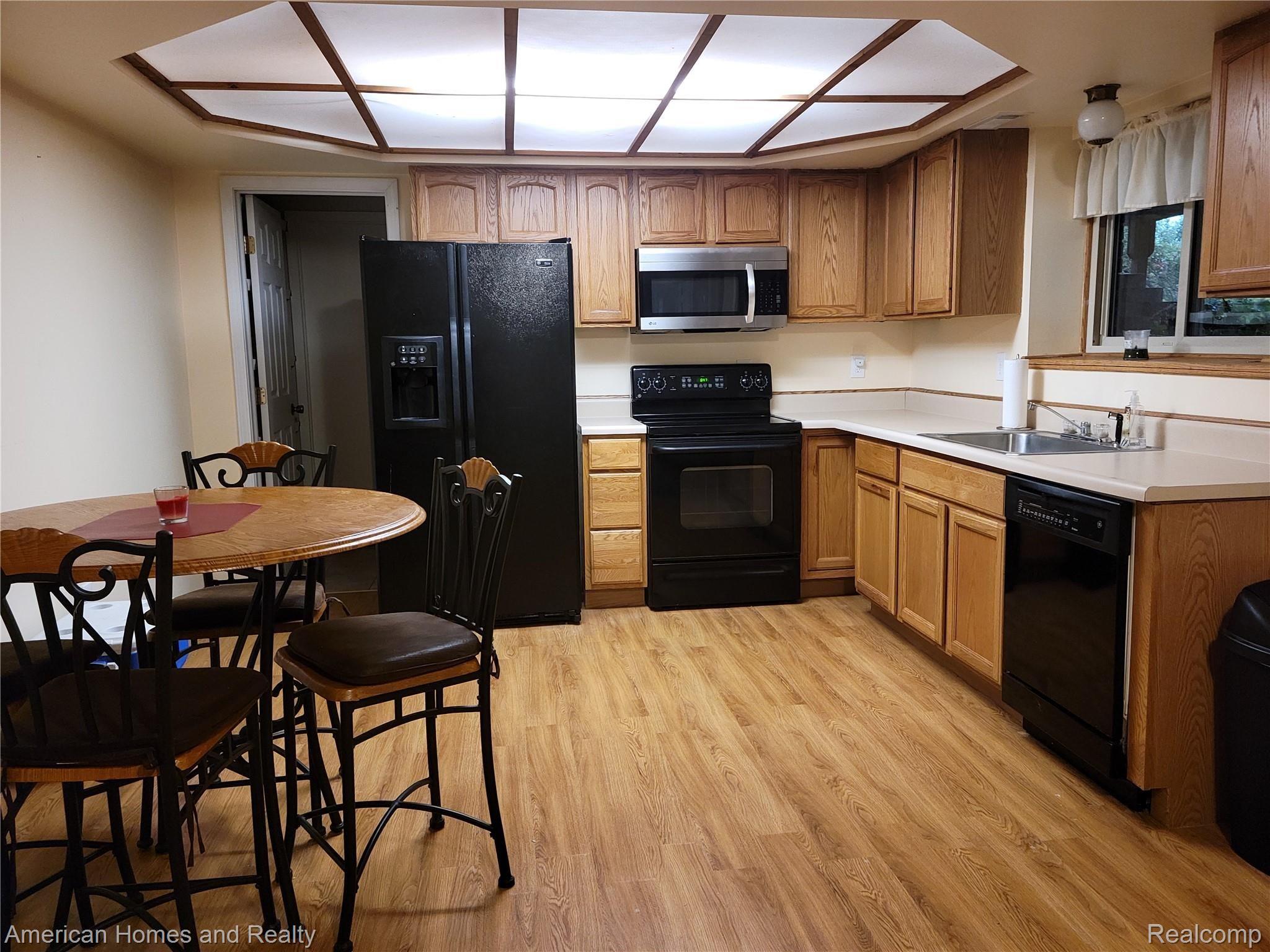 6530 Armstrong Road Imlay City, MI 48444 - Photo 31 of 59 Basement Kitchen, all appliances are included