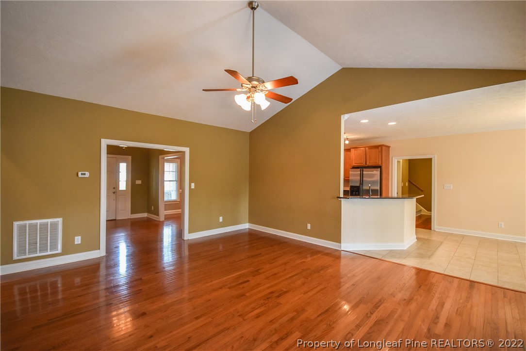 36 Falling Water Road Spring Lake, NC 28390 - Photo 13 of 50 a view of an empty room with window and wooden floor
