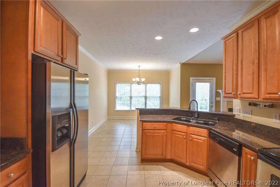 36 Falling Water Road Spring Lake, NC 28390 - Photo 20 of 50 a large kitchen with a large window and stainless steel appliances
