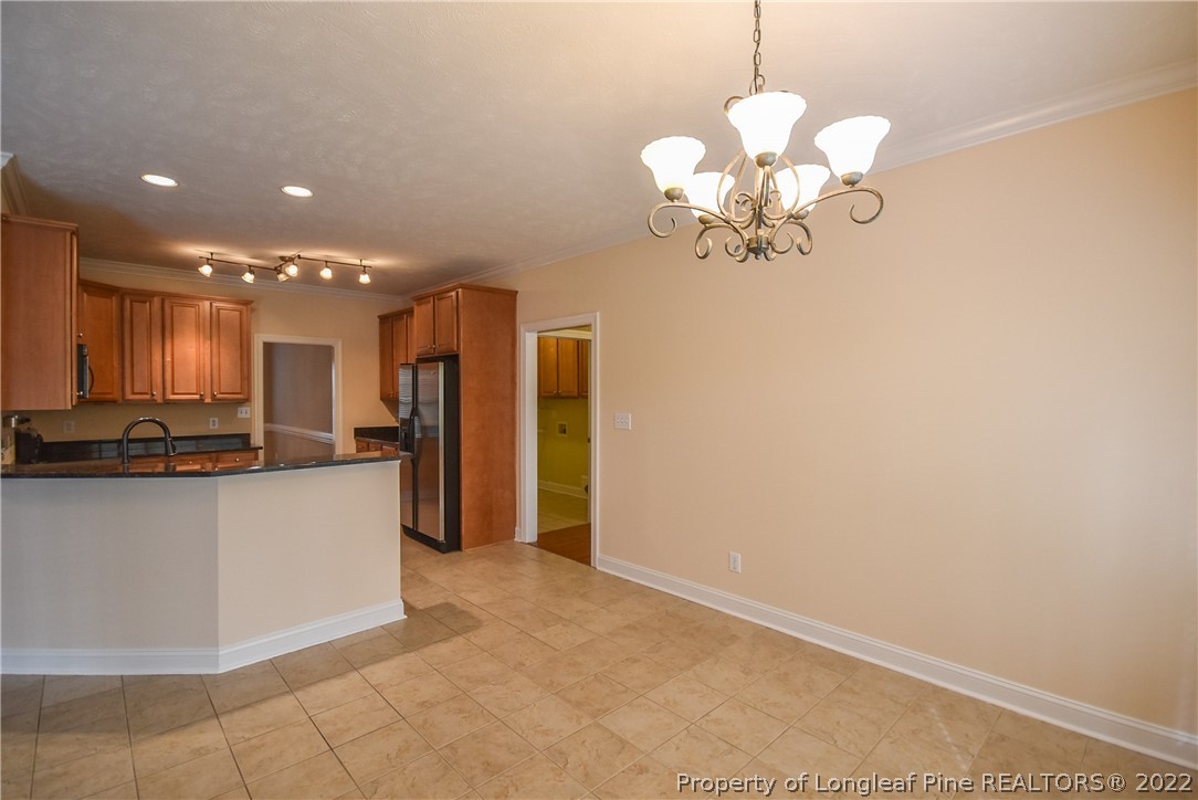 36 Falling Water Road Spring Lake, NC 28390 - Photo 22 of 50 a view of a kitchen with granite countertop cabinets