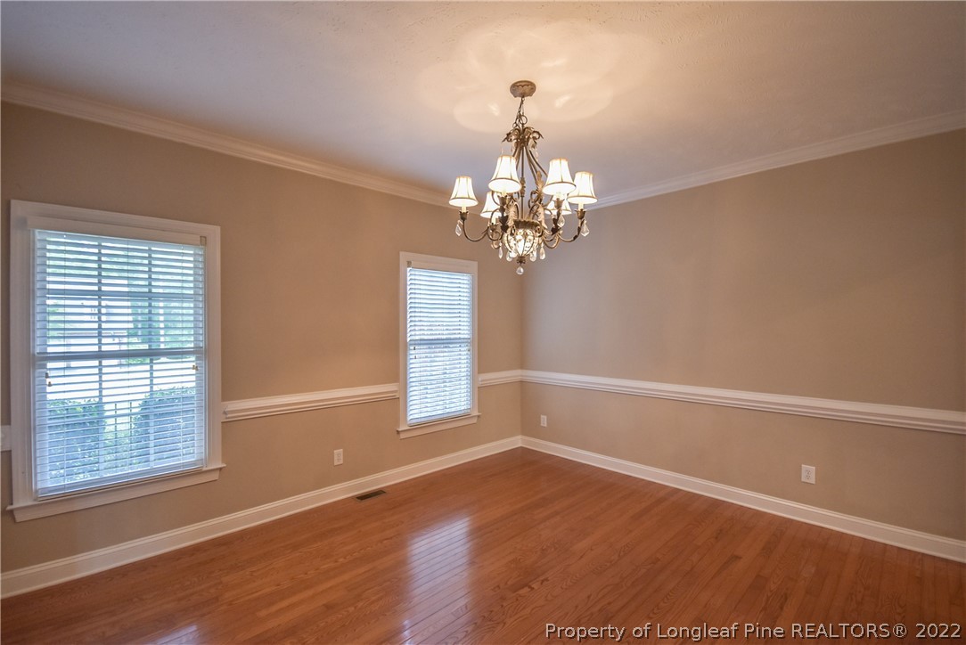 36 Falling Water Road Spring Lake, NC 28390 - Photo 25 of 50 a view of a livingroom with wooden floor and a large window