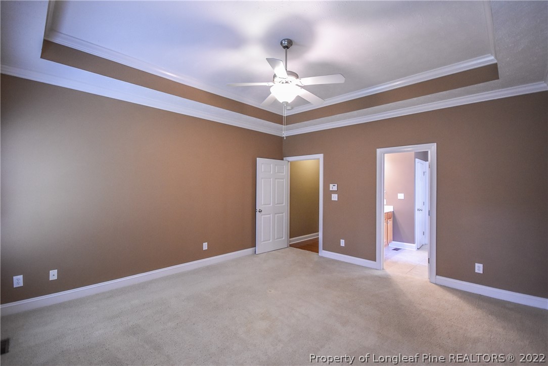 36 Falling Water Road Spring Lake, NC 28390 - Photo 29 of 50 en empty room with fan and a ceiling fan