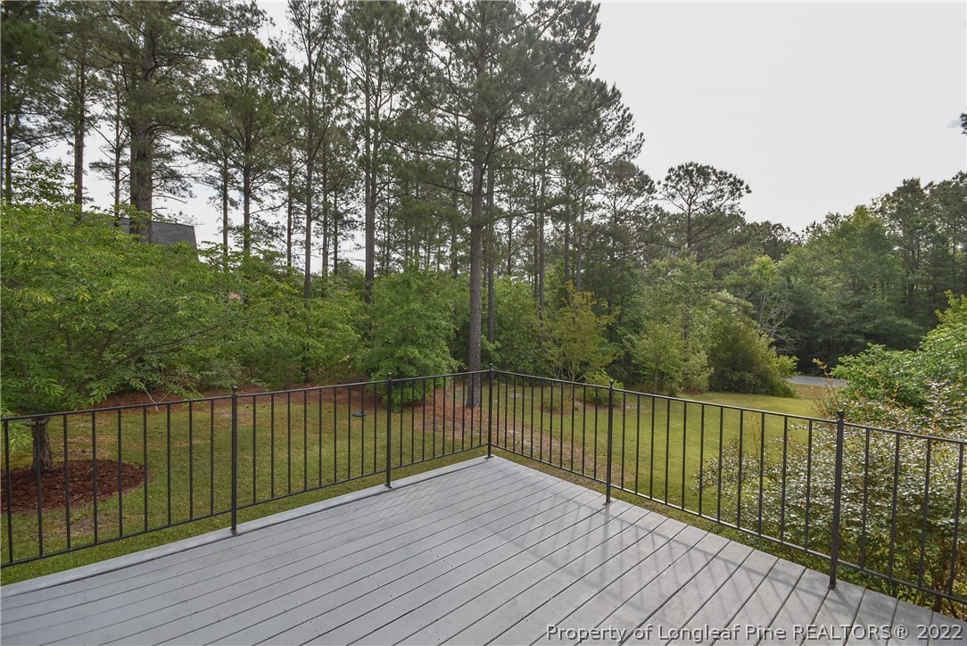 36 Falling Water Road Spring Lake, NC 28390 - Photo 43 of 50 a view of wooden deck with a lake view