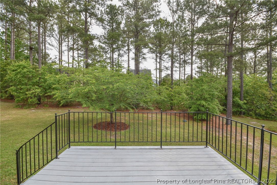 36 Falling Water Road Spring Lake, NC 28390 - Photo 46 of 50 a view of a deck with lake view
