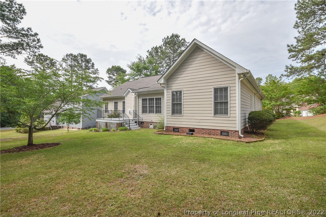36 Falling Water Road Spring Lake, NC 28390 - Photo 48 of 50 a view of a house with a yard