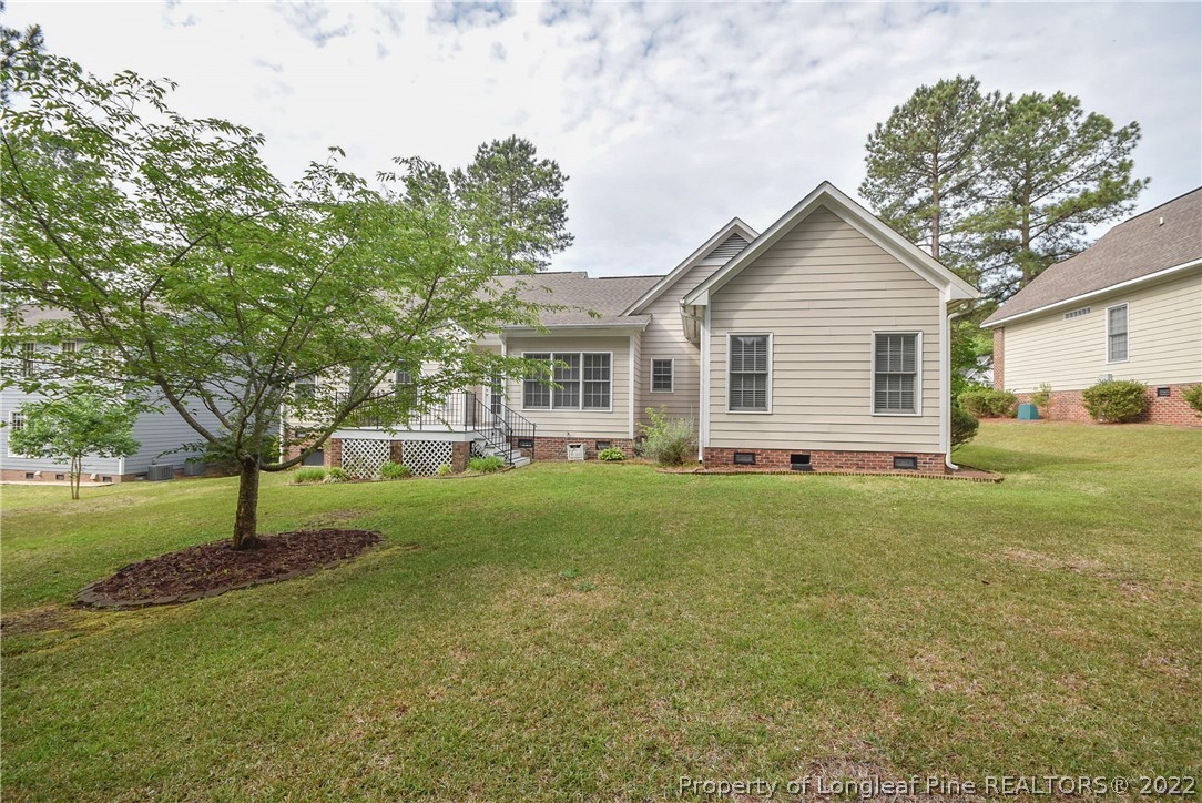 36 Falling Water Road Spring Lake, NC 28390 - Photo 49 of 50 a view of a house with a backyard