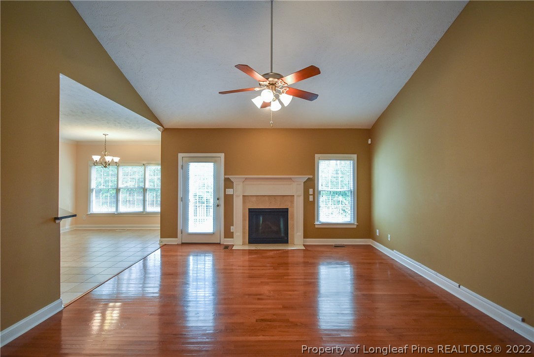 36 Falling Water Road Spring Lake, NC 28390 - Photo 10 of 50 a view of an empty room with window and wooden floor
