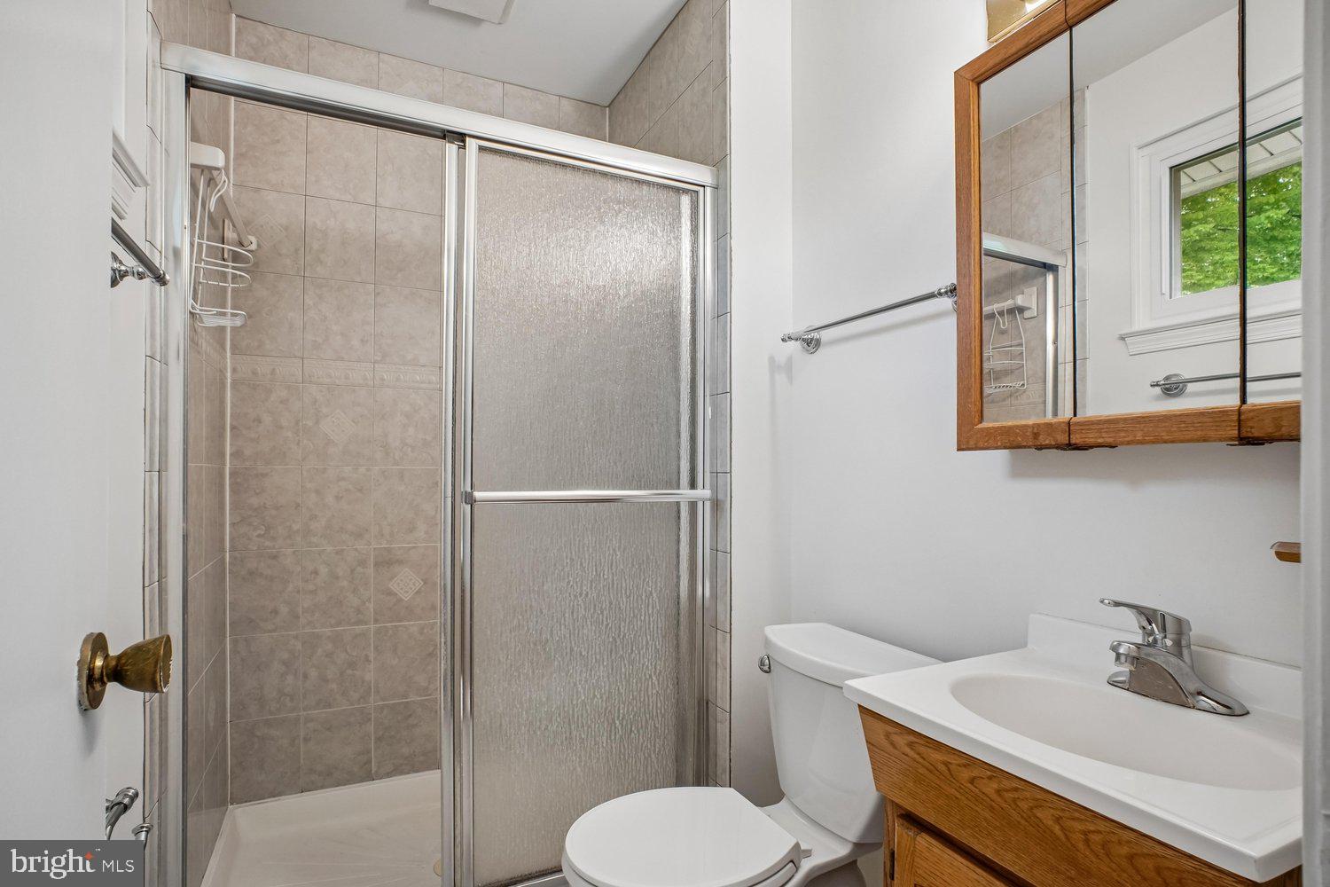 8933 Burke Lake Road Springfield, VA 22151 - Photo 27 of 47 Ensuite Primary
Bath , Walk-in Glass Shower