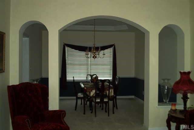 356 Seastone Street Raleigh, NC 27603 - Photo 3 of 8 ARCHED ENTRY INTO THE FORMAL DINING ROOM