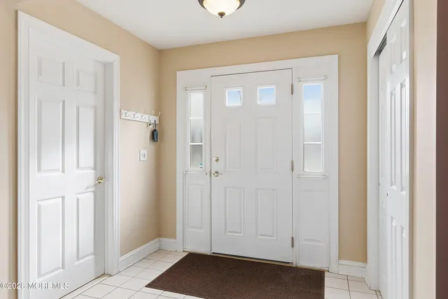 a view of empty room with windows