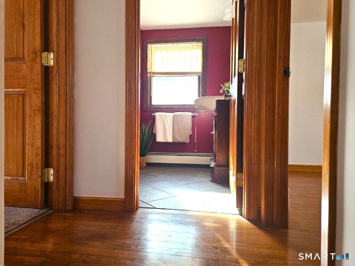 35 Lardner Road Bristol, CT 06010 - Photo 18 of 40 a view of a room with wooden floor