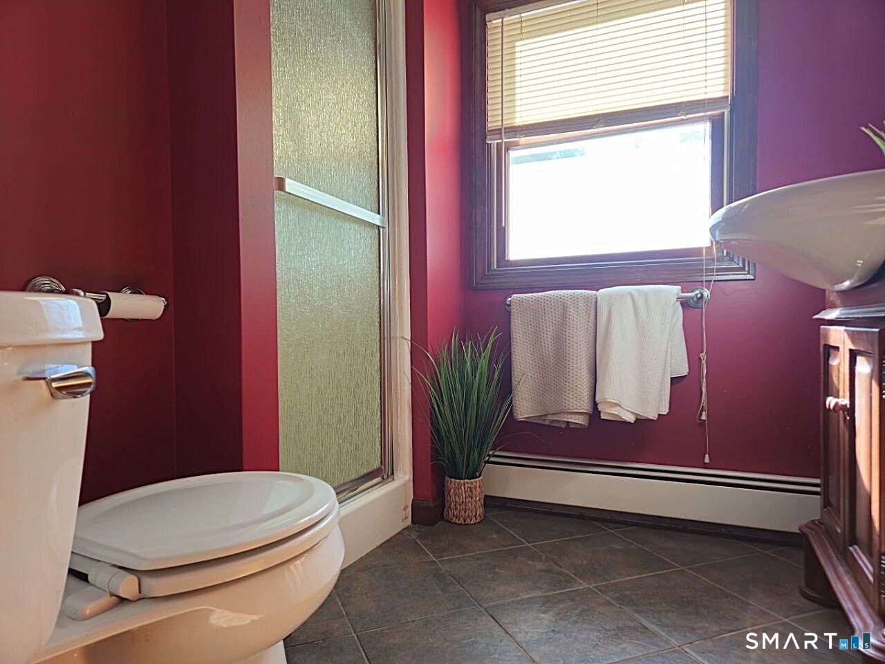 35 Lardner Road Bristol, CT 06010 - Photo 20 of 40 a bathroom with a toilet a sink and tub