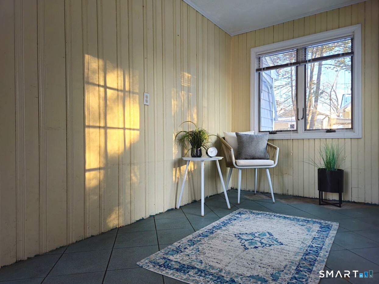 35 Lardner Road Bristol, CT 06010 - Photo 2 of 40 a living room with furniture and a window