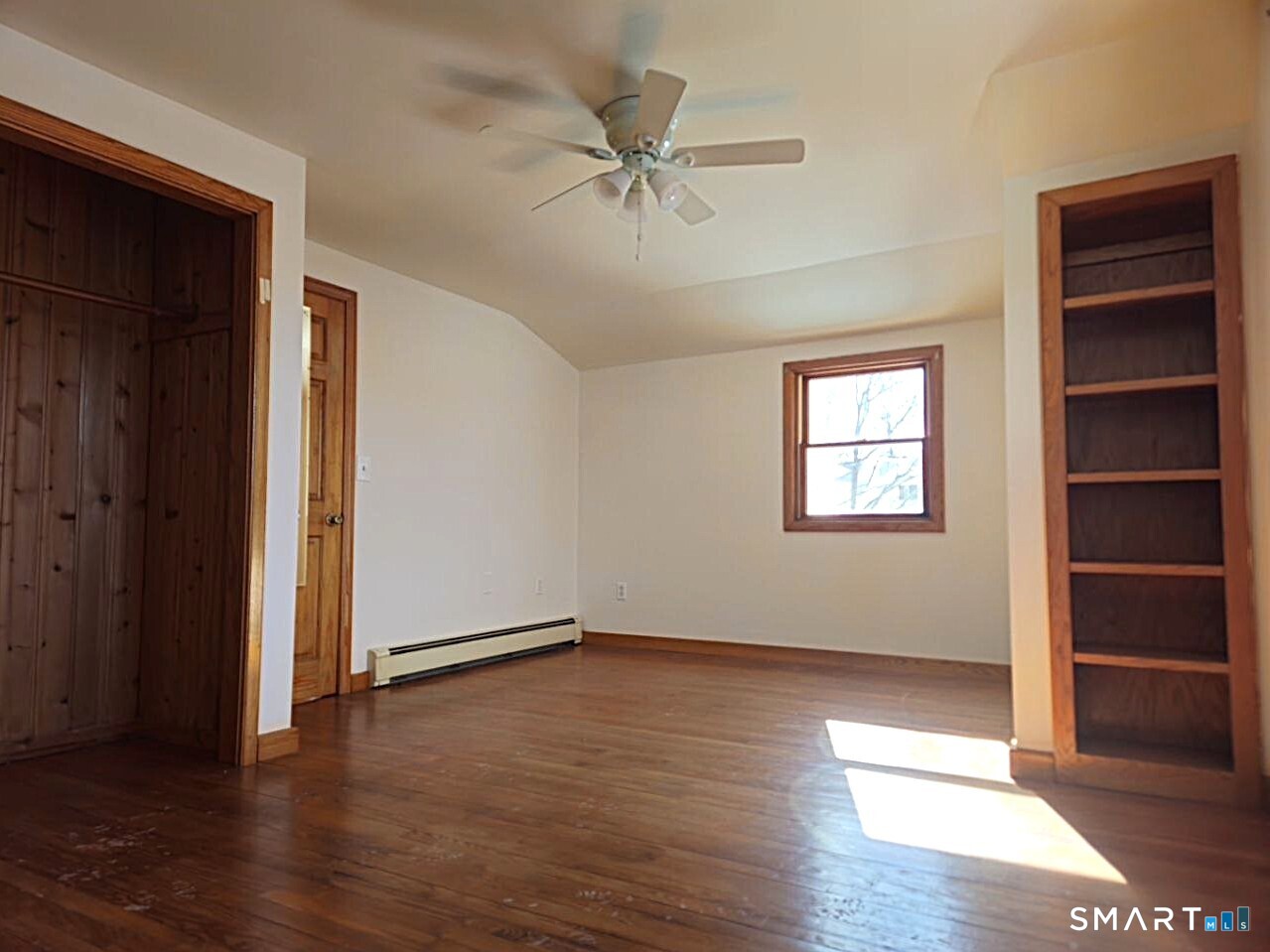 35 Lardner Road Bristol, CT 06010 - Photo 22 of 40 an empty room with wooden floor closet and windows