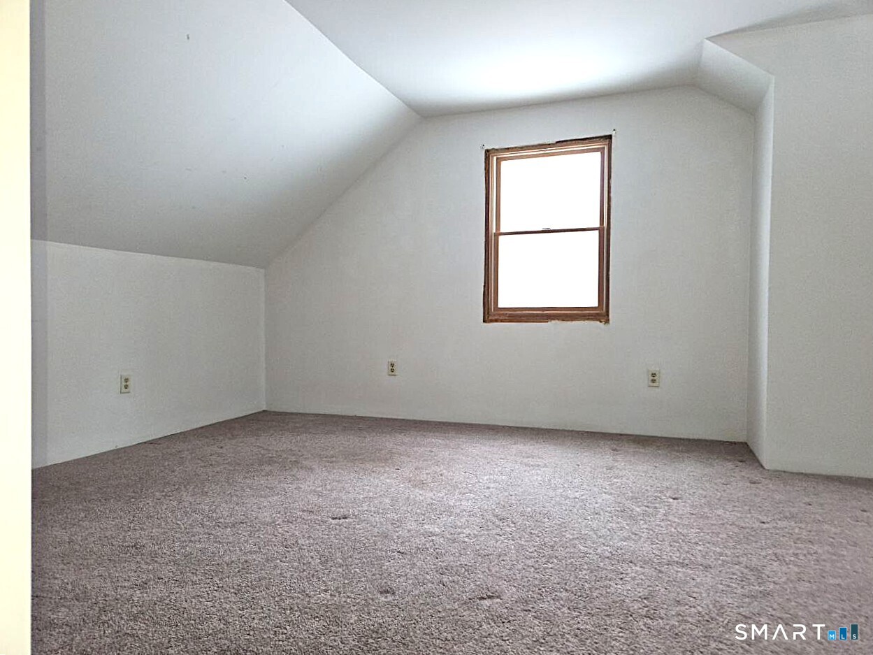 35 Lardner Road Bristol, CT 06010 - Photo 23 of 40 an empty room with a window