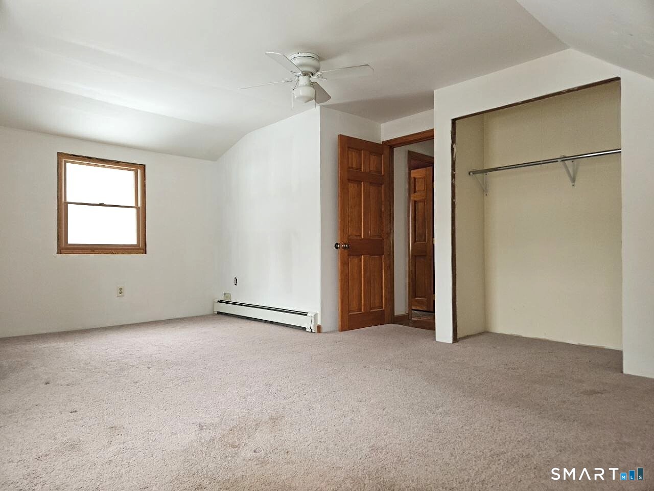 35 Lardner Road Bristol, CT 06010 - Photo 25 of 40 an empty room with closet and a ceiling fan