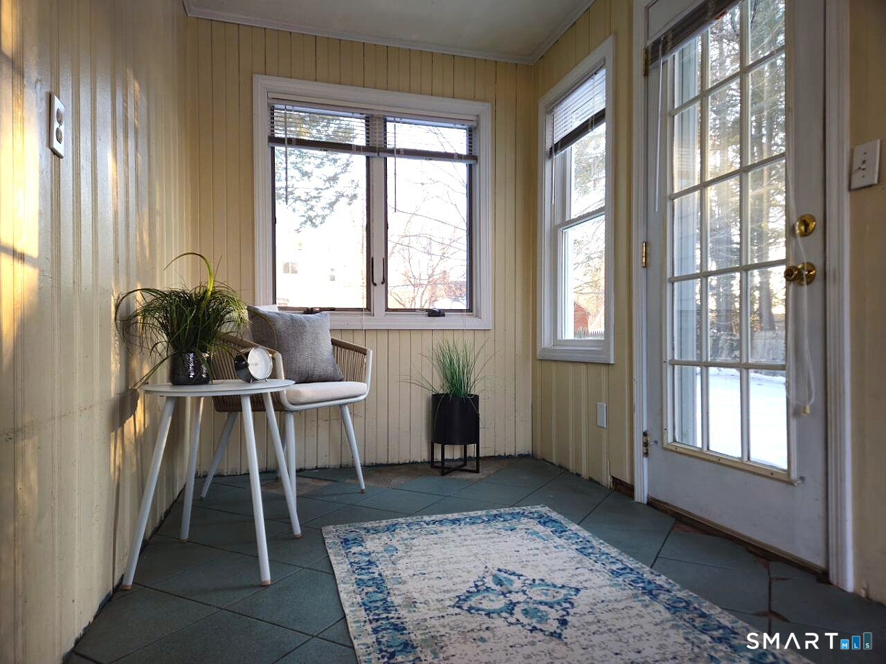 35 Lardner Road Bristol, CT 06010 - Photo 3 of 40 a living room with furniture and a floor to ceiling window