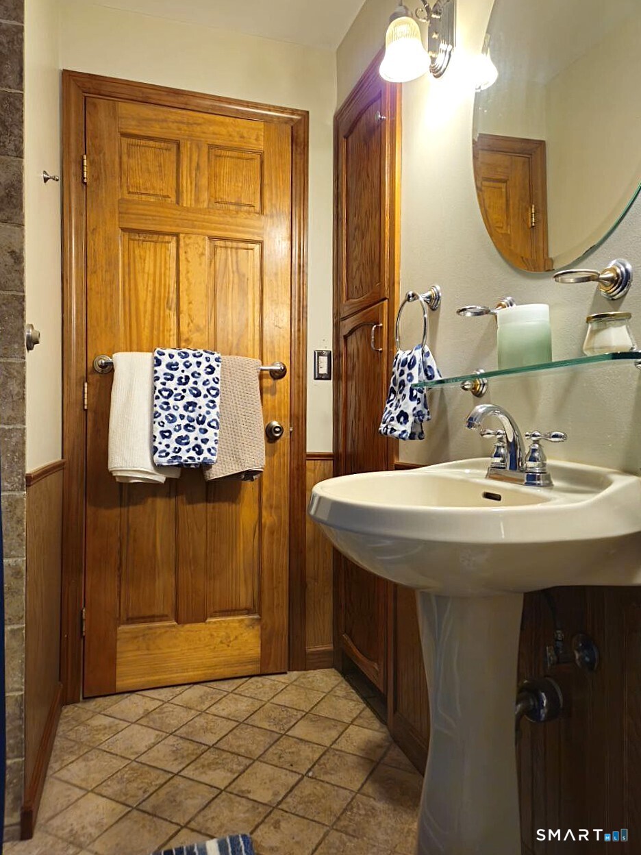 35 Lardner Road Bristol, CT 06010 - Photo 8 of 40 a bathroom with a sink and a mirror