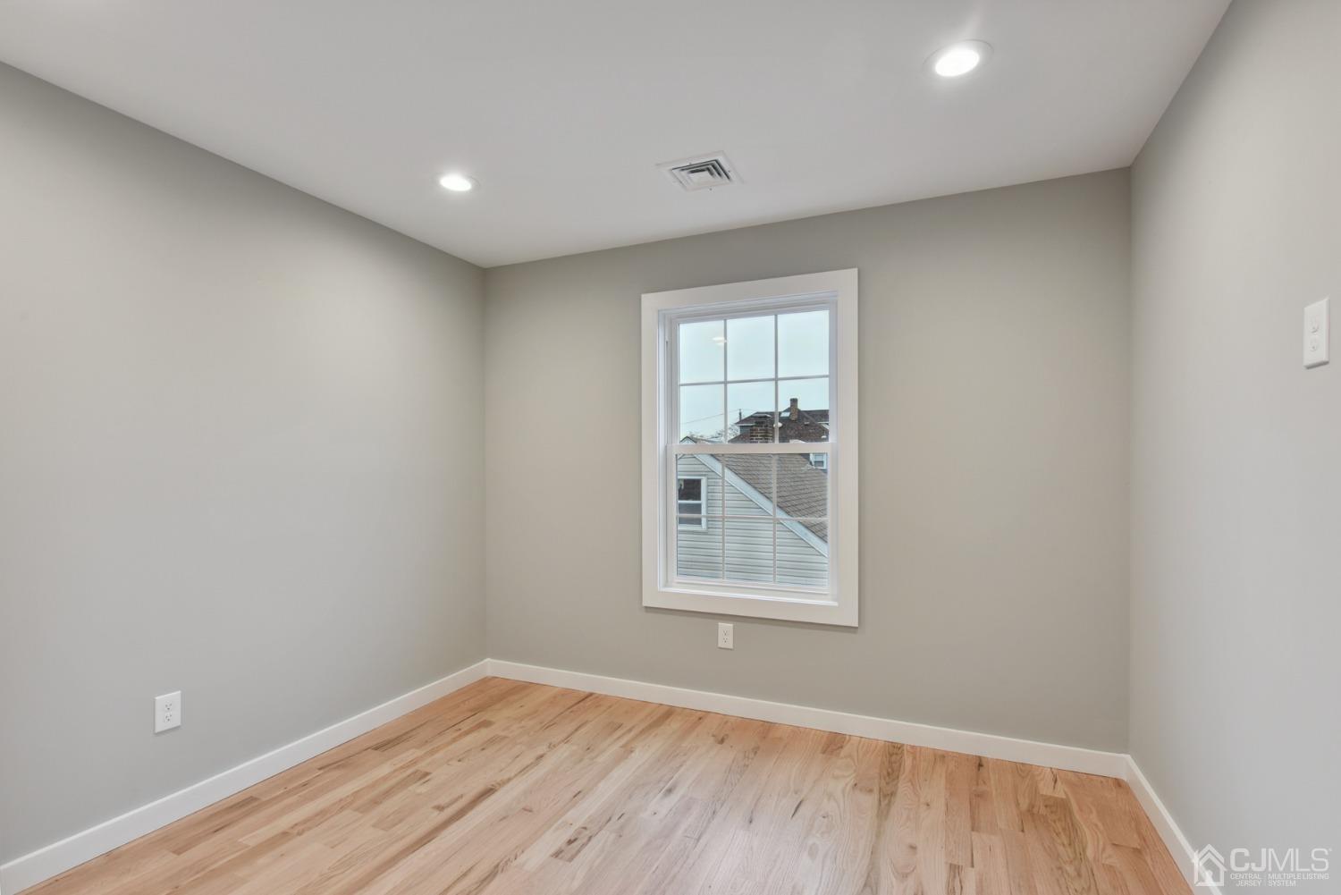 13 Albany Street Edison, NJ 08837 - Photo 18 of 26 an empty room with windows
