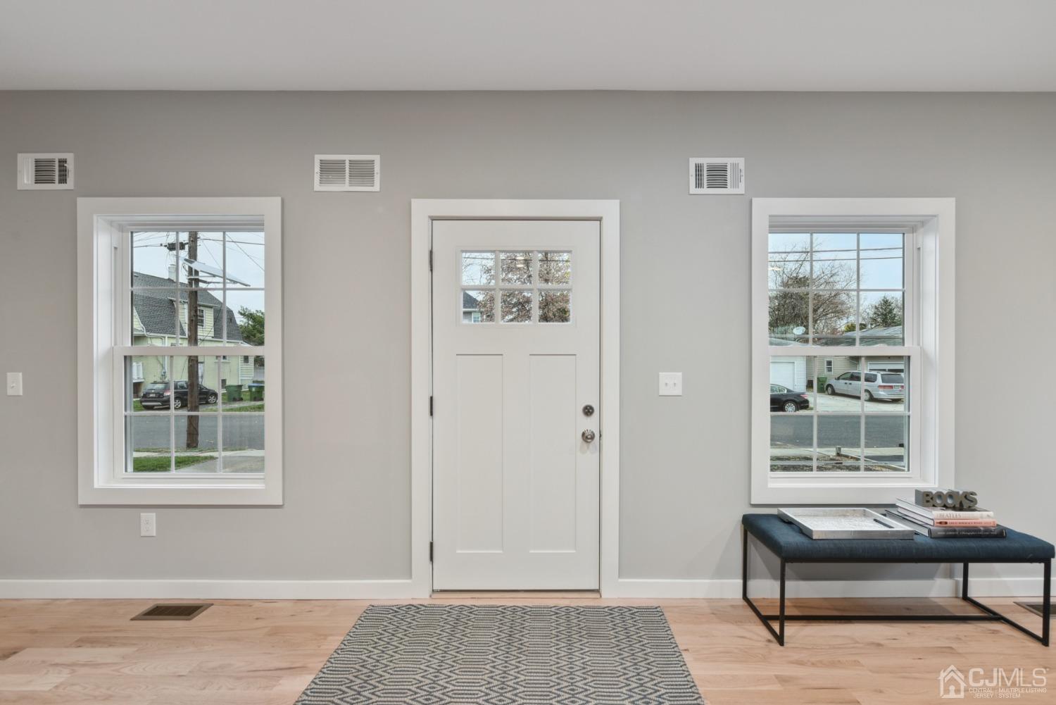 13 Albany Street Edison, NJ 08837 - Photo 4 of 26 a view of a livingroom with furniture and windows