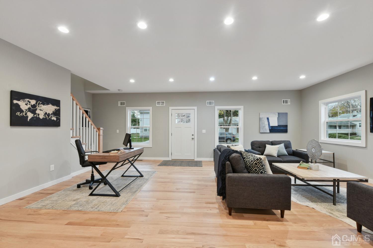 13 Albany Street Edison, NJ 08837 - Photo 6 of 26 a living room with furniture and wooden floor