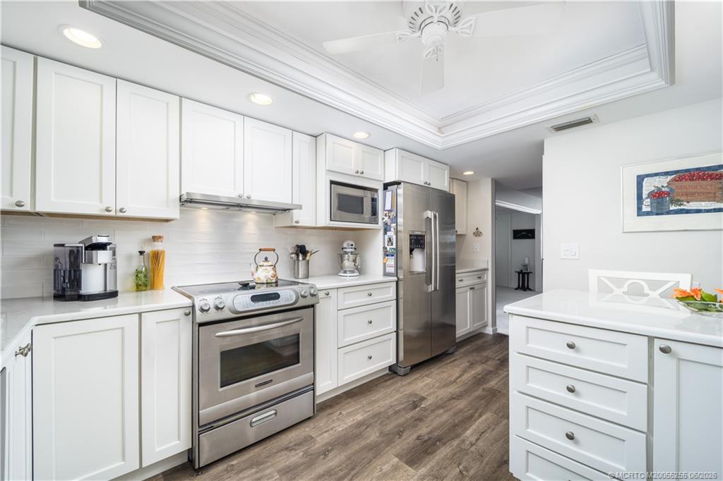 3100 Southeast Pruitt Road, Unit F101 Port St. Lucie, FL 34952 - Photo 18 of 37 LED lighting and shiny stainless appliances