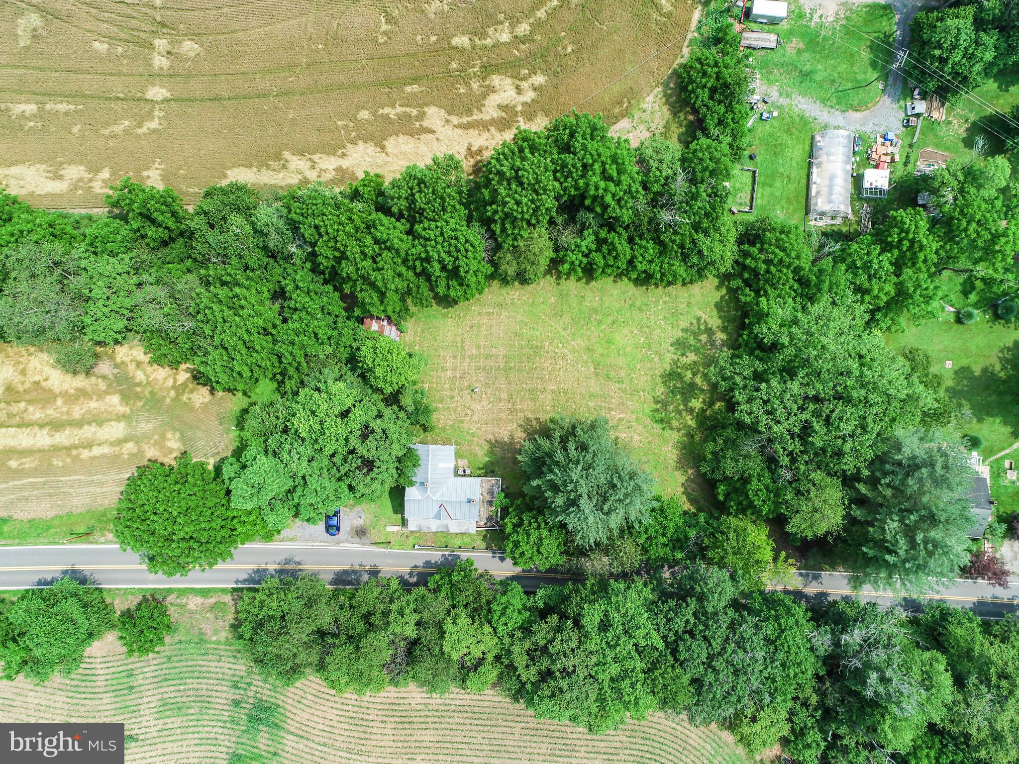 7401 Watersville Road Mount Airy, MD 21771 - Photo 18 of 26 a view of a garden with an outdoor space