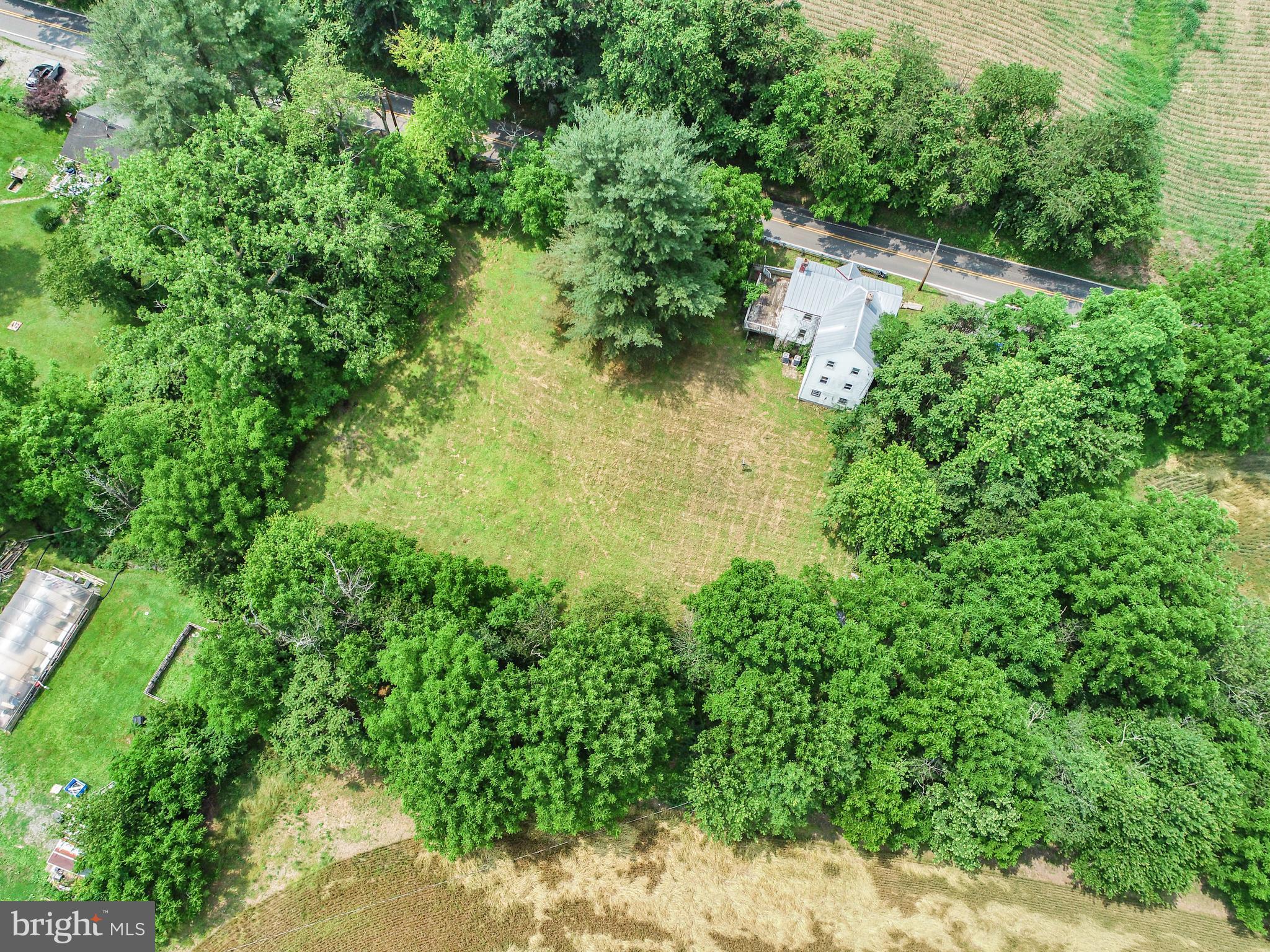 7401 Watersville Road Mount Airy, MD 21771 - Photo 19 of 26 an aerial view of residential house with outdoor space and trees all around