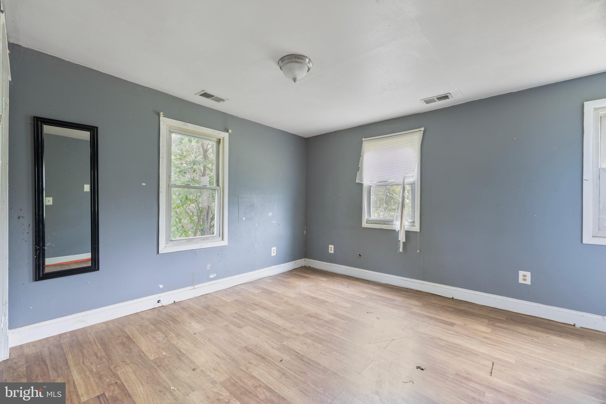 7401 Watersville Road Mount Airy, MD 21771 - Photo 10 of 26 a view of an empty room with a window