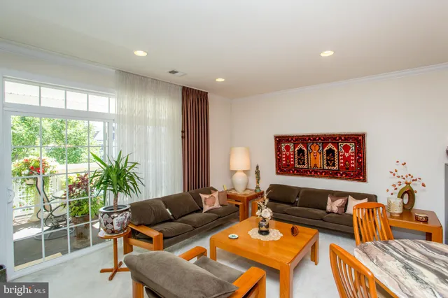 a view of balcony with furniture