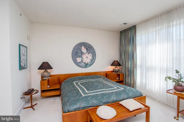 a room with furniture and flat screen tv