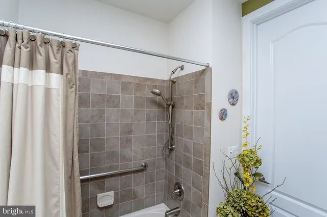 a room with furniture and white walls