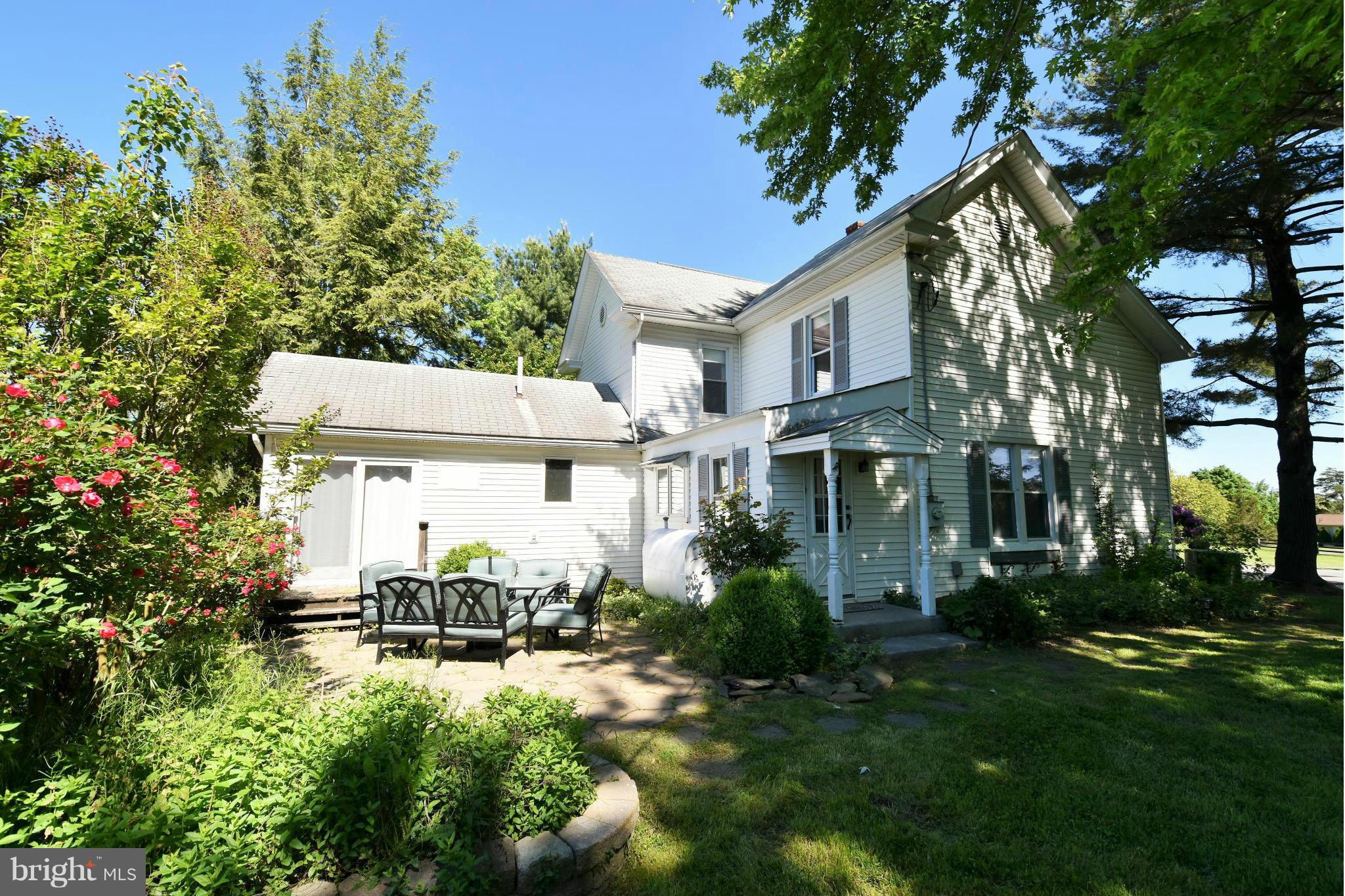 Rear of Home with Stone Patio