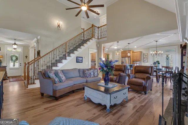 a kitchen with granite countertop a stove sink and cabinets