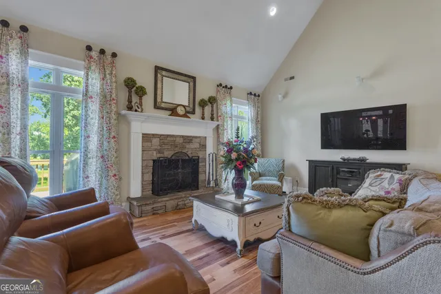 a bed room with a bed and a chandelier