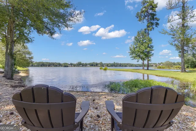 a view of balcony with outdoor seating and wooden floor