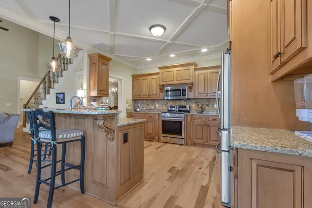 a spacious bedroom with a bed and a window