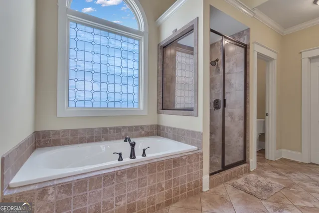 a view of balcony with outdoor seating and wooden floor