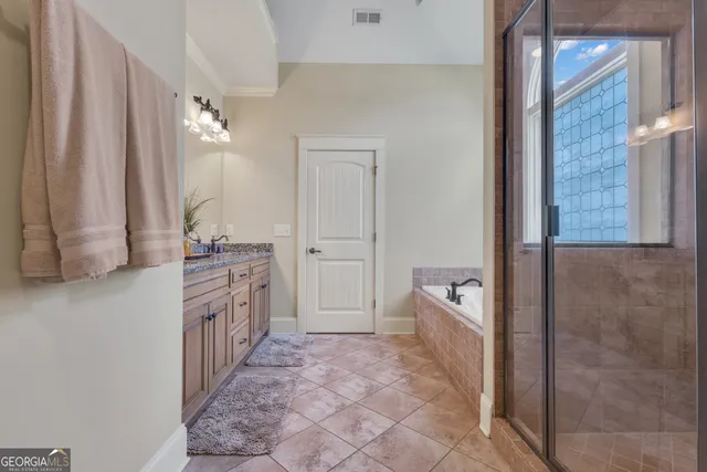 a front view of building with yard