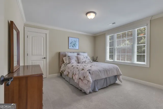 an aerial view of a house with a garden