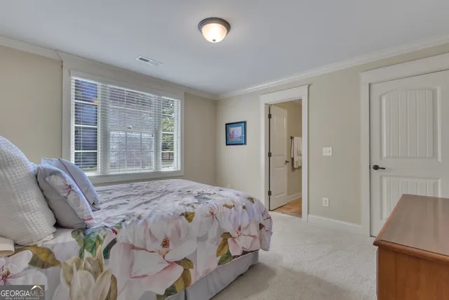 an aerial view of a house with a lake view