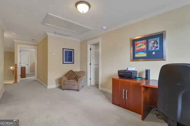 a view of a yard with fountain in front of it